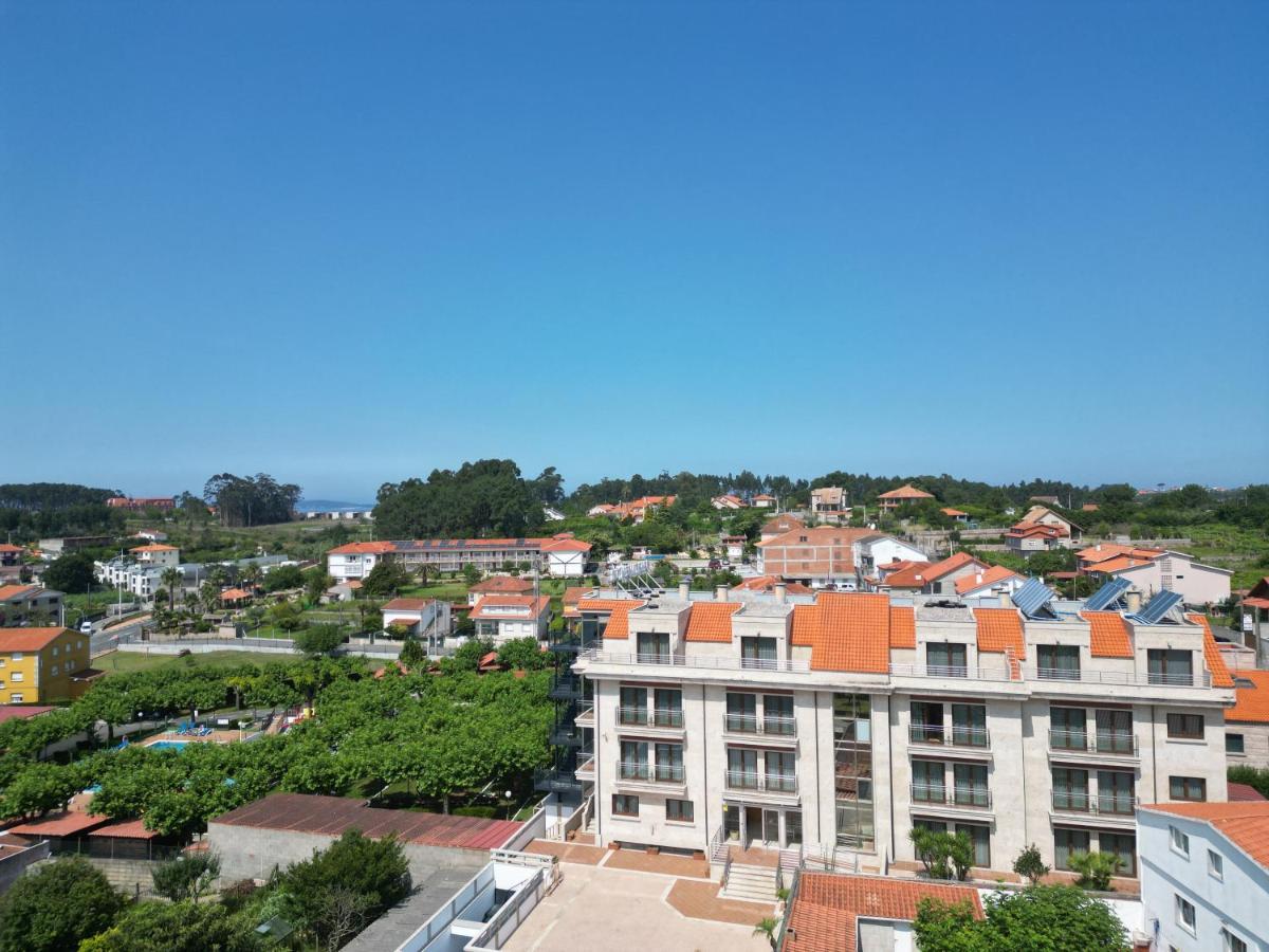 Apartamentos Playa Canelas Санхенхо Экстерьер фото